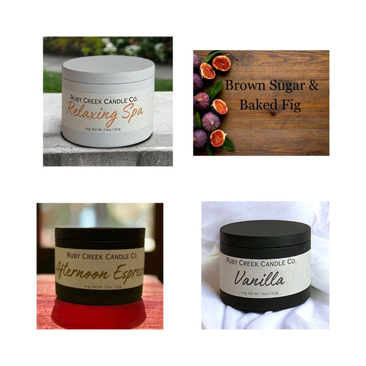 a photo of 4 candles in both white or black metal tins labelled relaxing spa, afternoon espresso, vanilla, brown sugar & baked fig